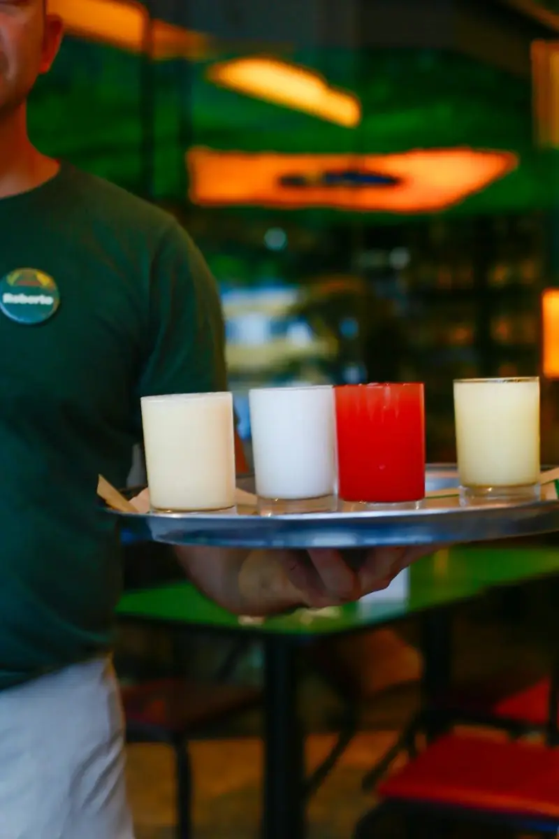 Academia da Cachaça's batidas on a tray — award-winning Brazilian cocktails